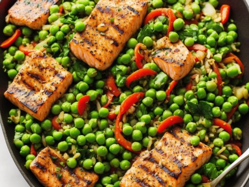 Stir fry of green peas with grilled salmon