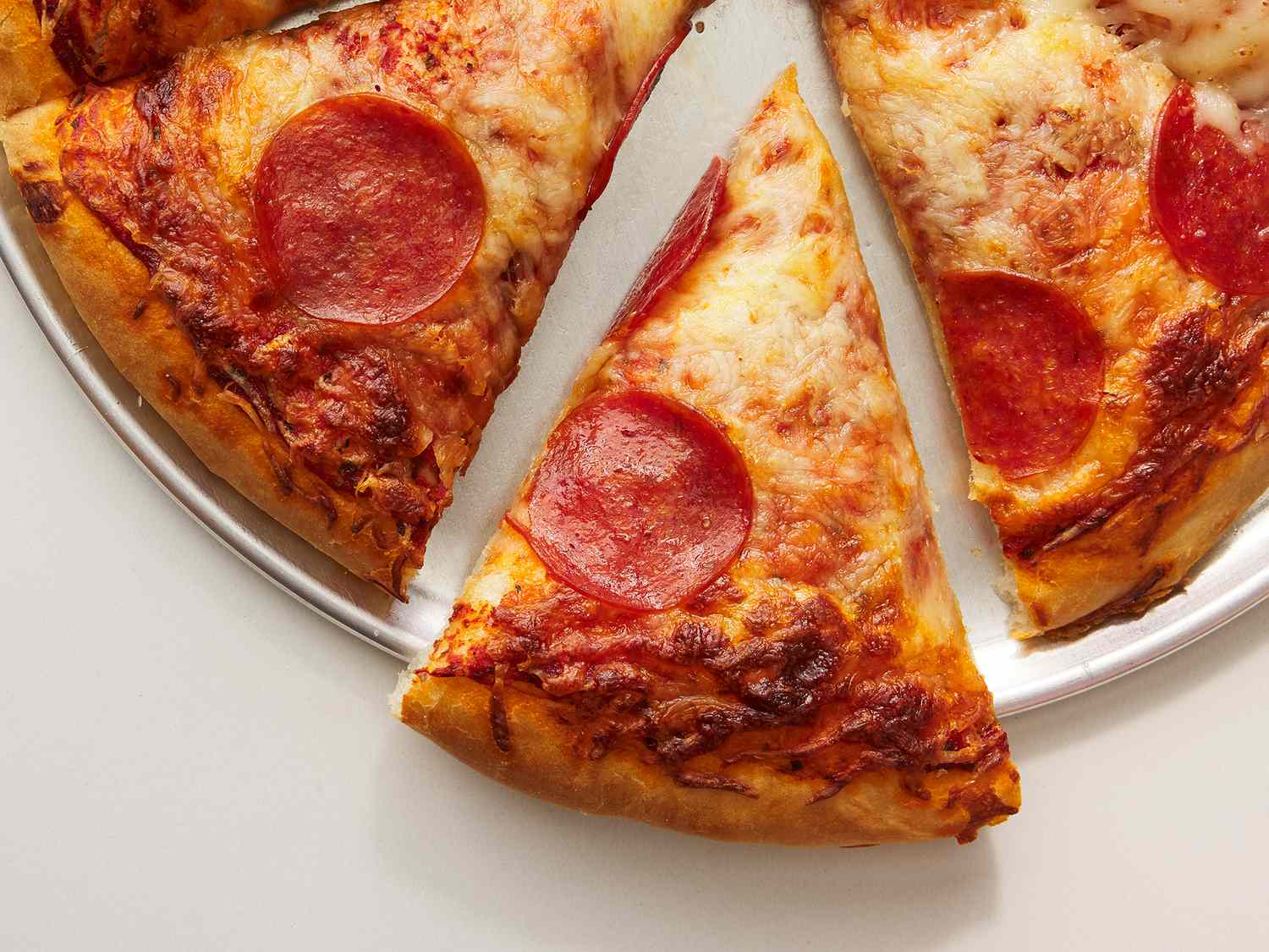 how-to-get-large-slices-of-pizza-from-small-ovens-or-pies