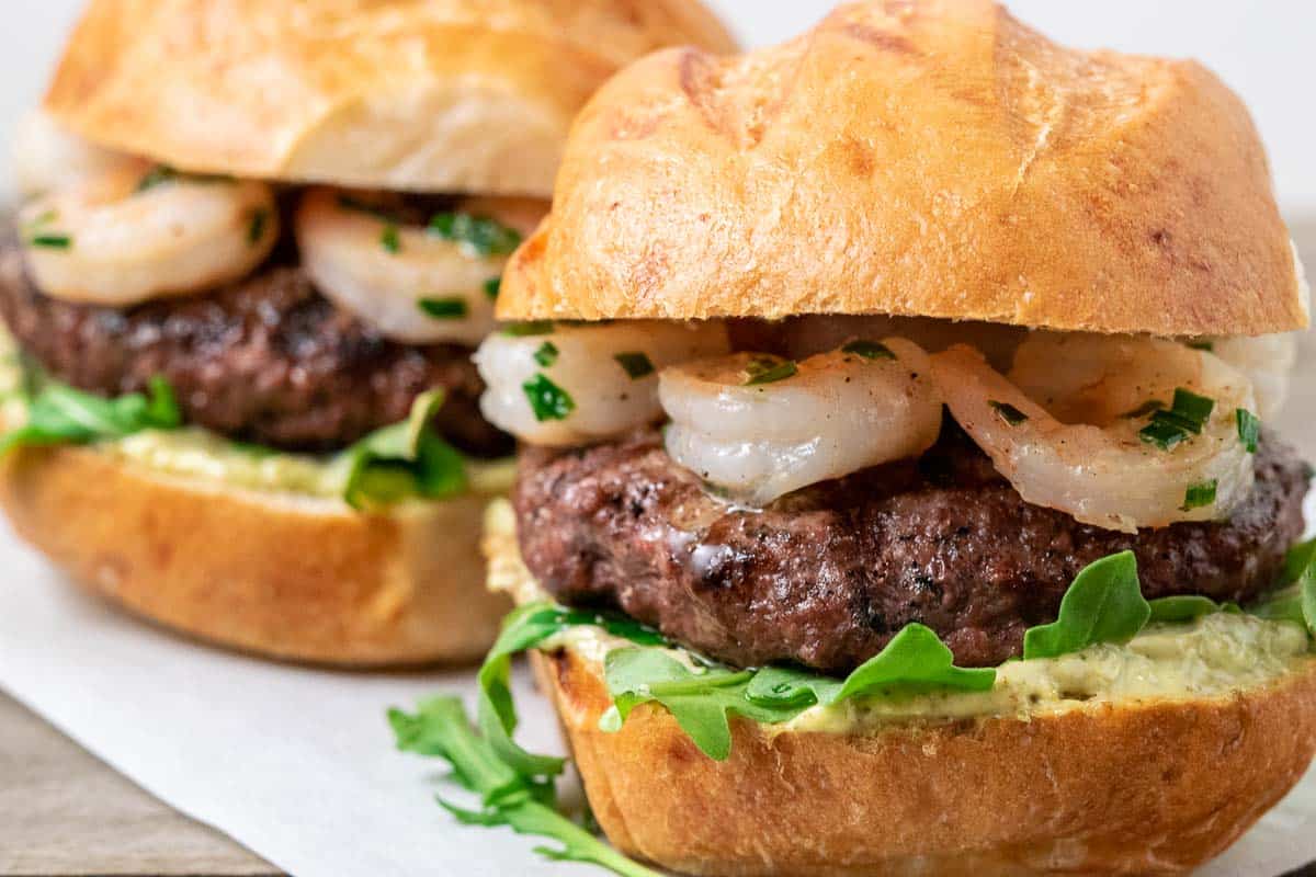 the-burger-lab-how-to-make-surf-turf-burgers-bacon-and-lobster-topped-burgers