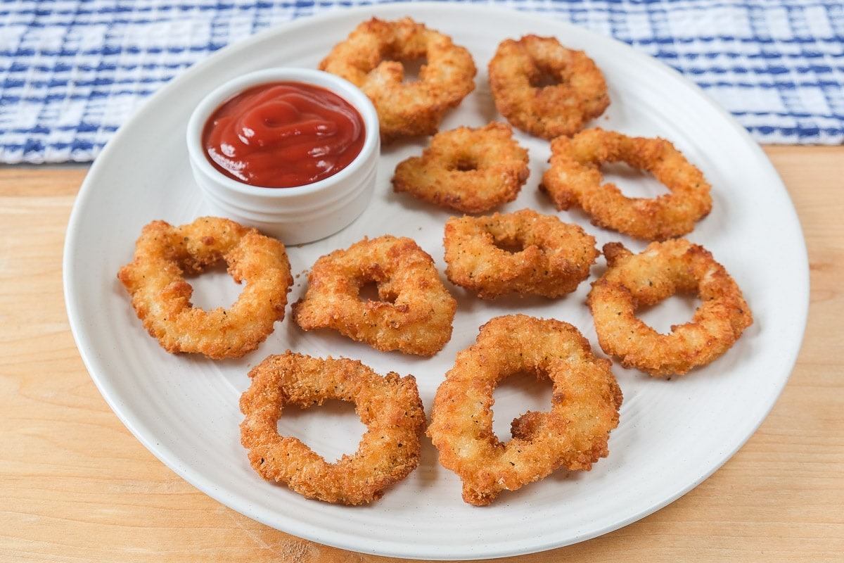 Fried squid rings breaded with lemon Stock Photo by ©koss13 60000873