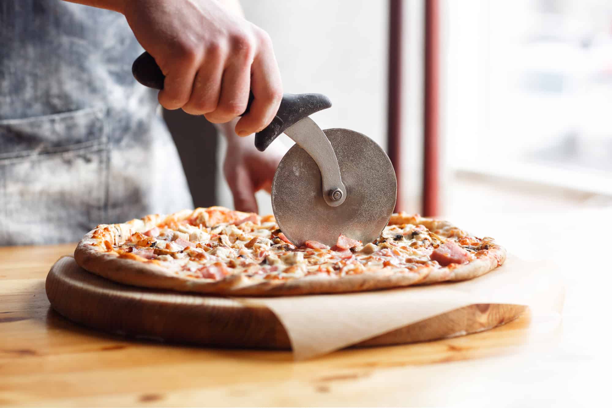how-to-cut-a-frozen-pizza-in-half