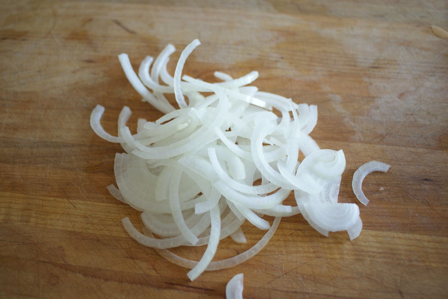 Paper-thin onion slices