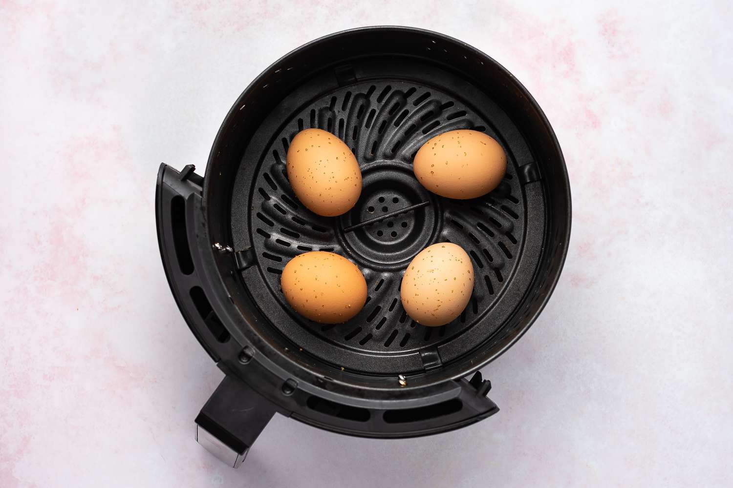 Preparing eggs in an air fryer