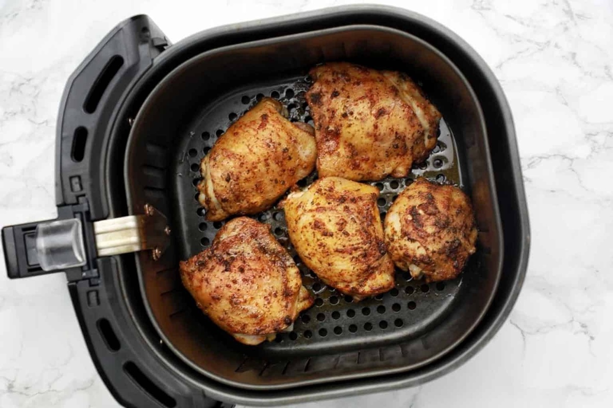 https://recipes.net/wp-content/uploads/2023/11/how-to-cook-frozen-chicken-thighs-in-ninja-foodi-1699341593.jpg