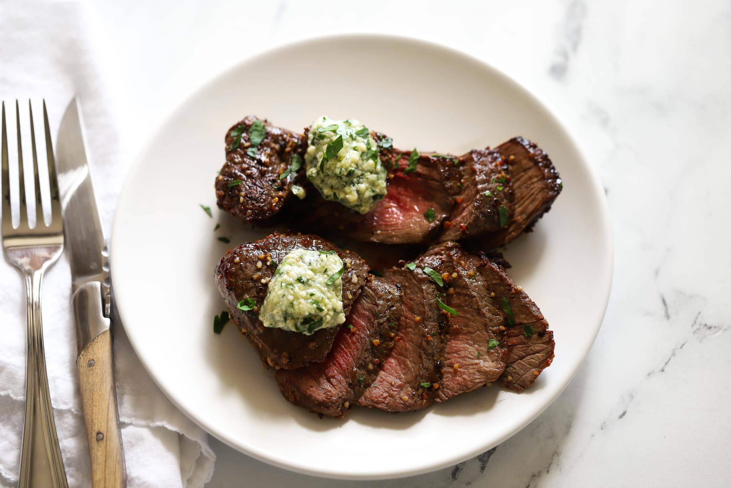 https://recipes.net/wp-content/uploads/2023/11/how-to-cook-steak-in-ninja-dual-air-fryer-1700162460.jpg