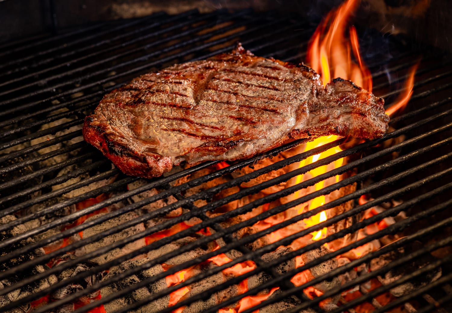How To Grill A Strip Steak On A Charcoal Grill