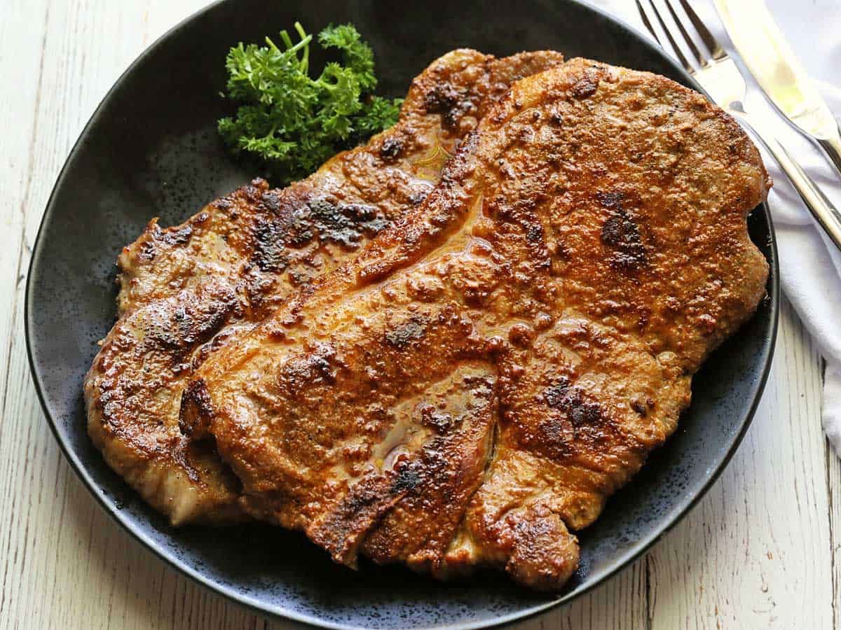 How To Pan Fry Pork Steak - Recipes.net