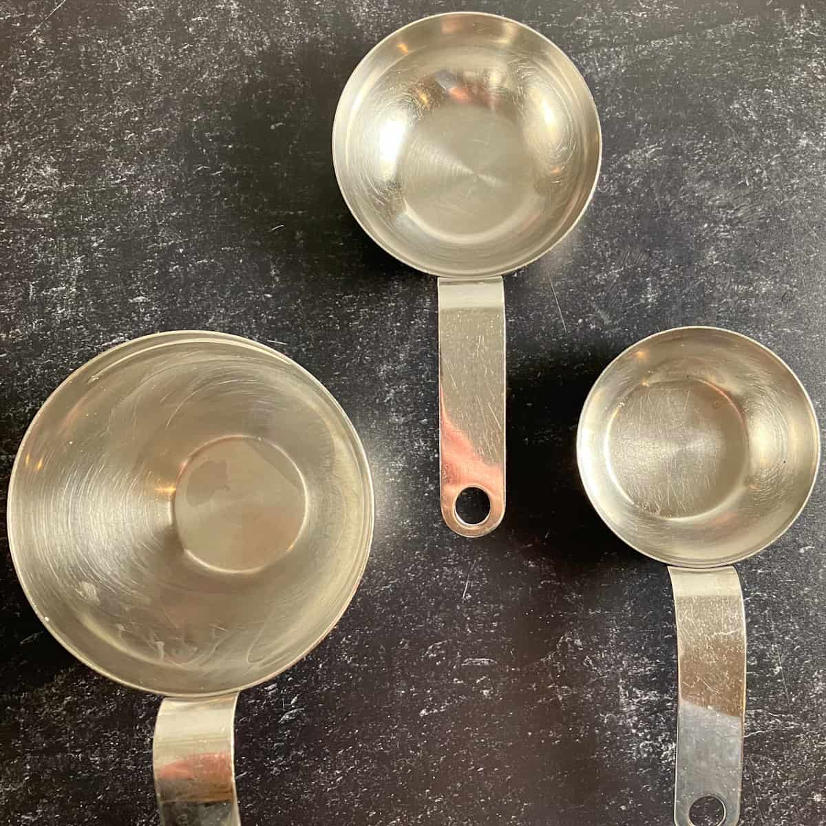 These measuring cups are designed to visually represent fractions