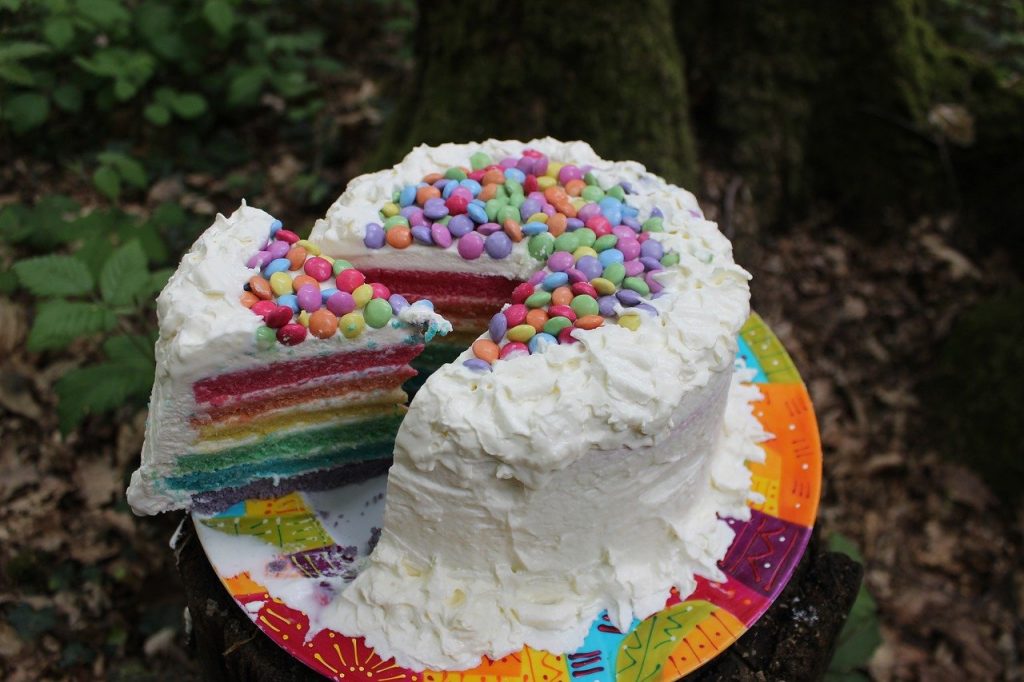 Rainbow Poke Cake With Whipped Cream Recipe