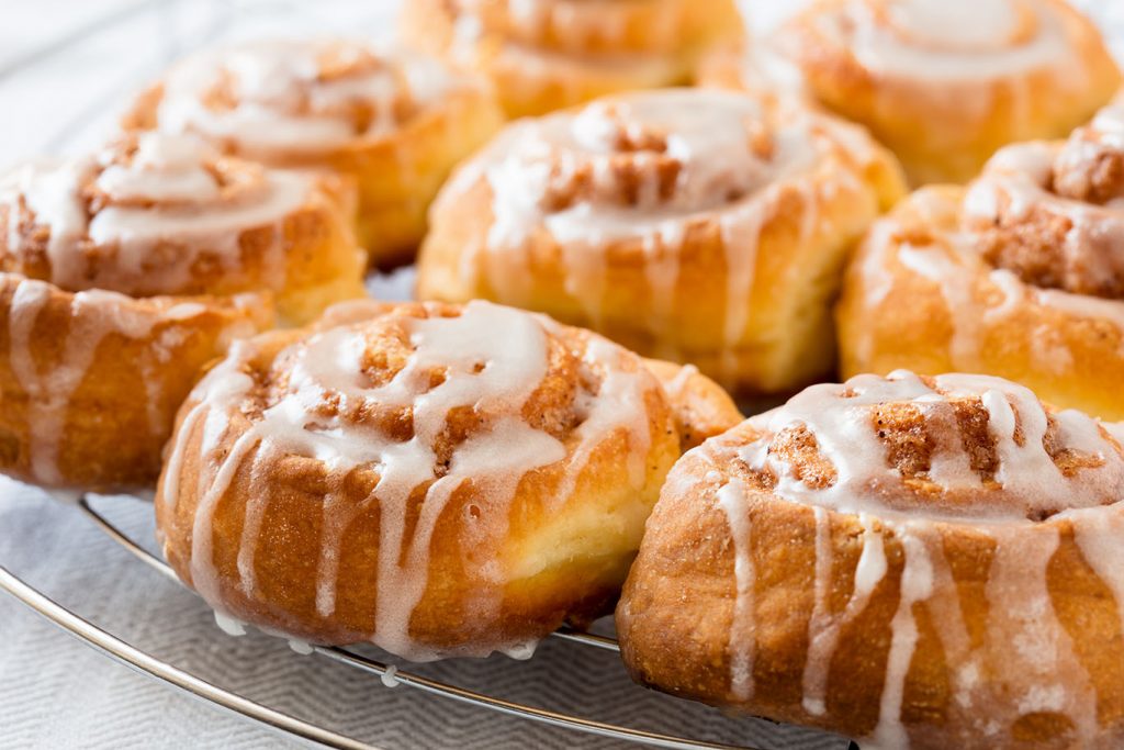 apple pie cinnamon rolls drizzled with sweet glaze