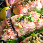 poached salmon with caper-butter sauce