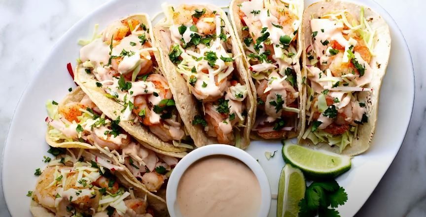 street-style shrimp tacos with corn, bacon and lime crema recipe