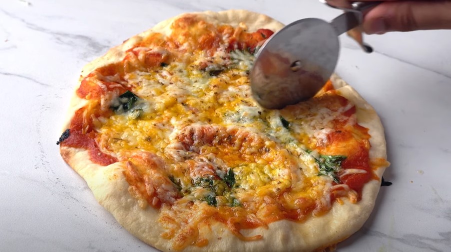 cheesy cast-iron thin crust pizza recipe