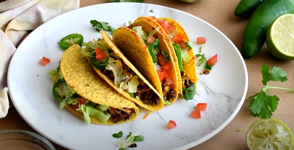 vegetarian arugula and black bean tacos with pickled radish and feta recipe