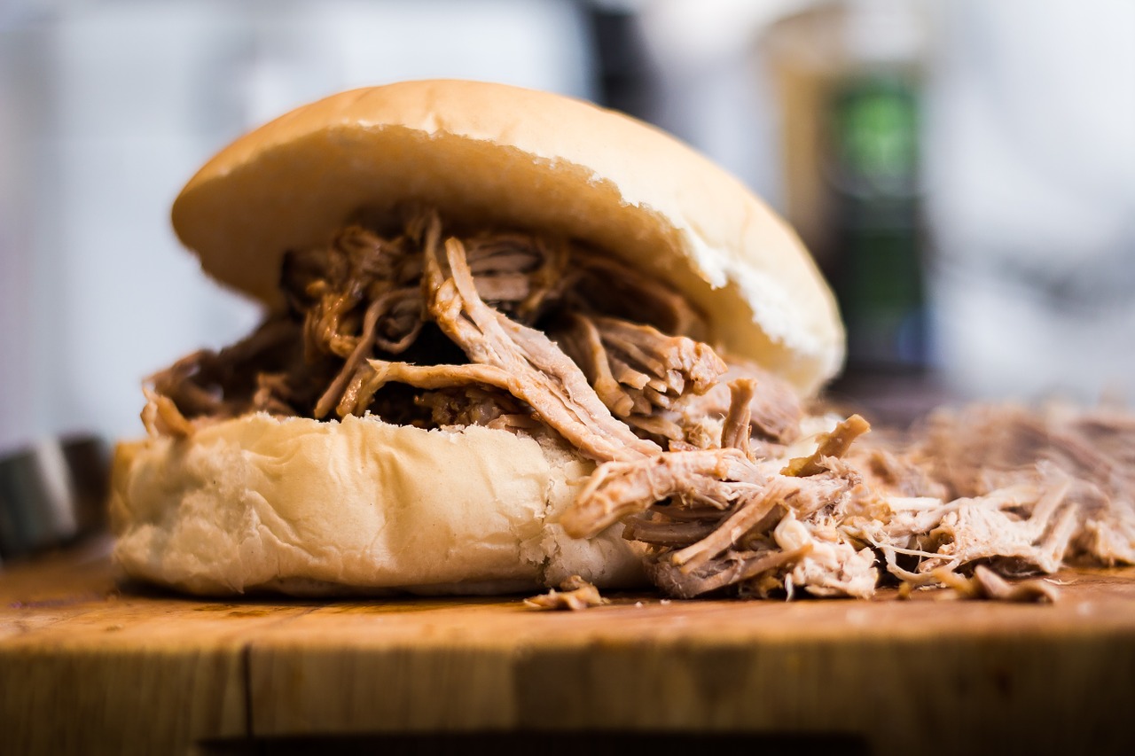 Instant Pot Pulled Pork Recipe - Tender pulled pork in a bun