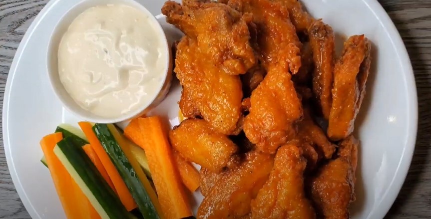 Air Fryer Chicken Wings with Honey Buffalo Sauce