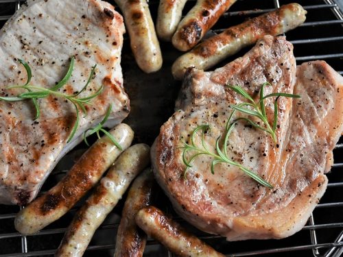 Grilled Sherry Pork Chops Recipe - Pork chops marinated in sherry, molasses, and soy sauce, then grilled until done.