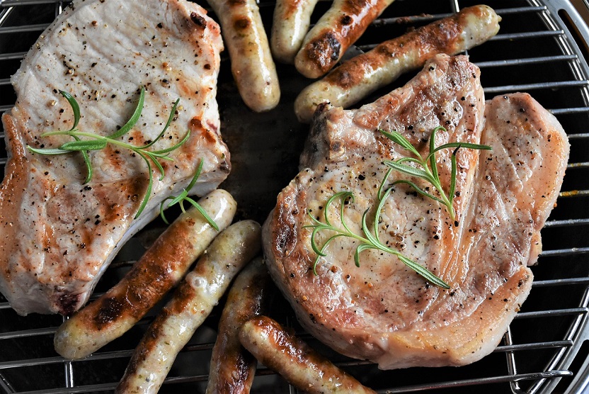 Grilled Sherry Pork Chops Recipe - Pork chops marinated in sherry, molasses, and soy sauce, then grilled until done.