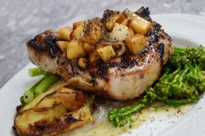 Mahogany Pork Chops Recipe - Pan seared pork chops that have been marinated in a mixture of teriyaki sauce and molasses.