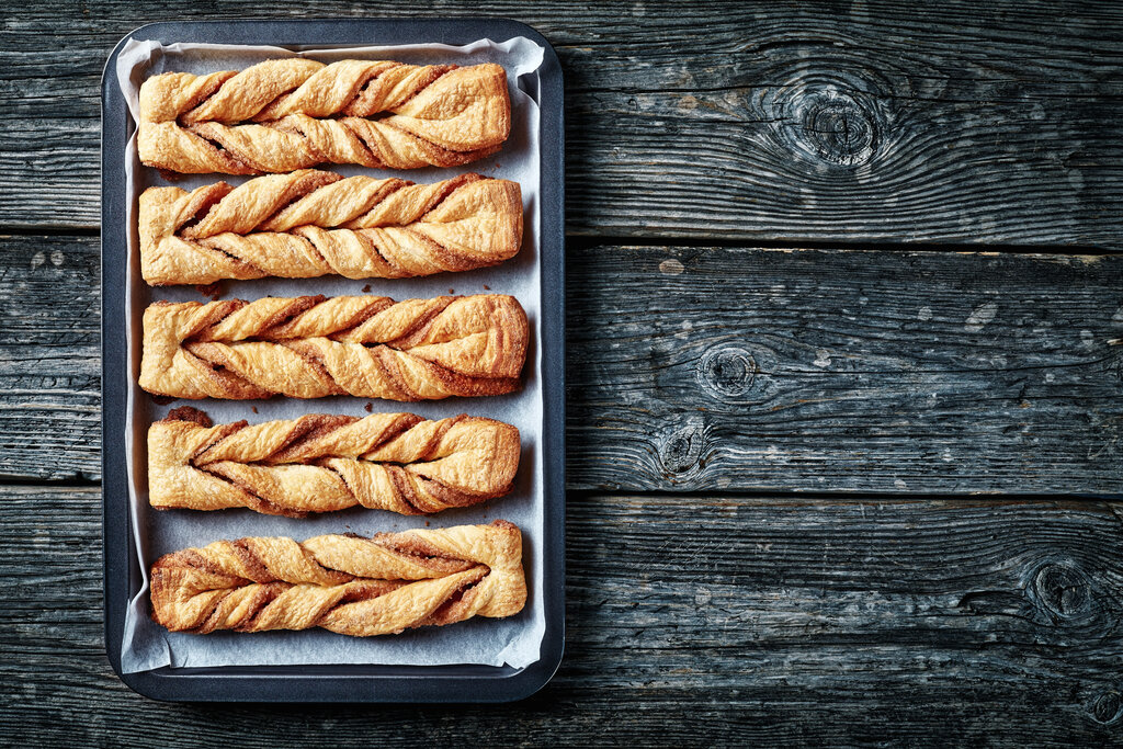 Cinnamon Twists Recipe, sweet and spiced cinnamon twist dessert made from crescent rolls, ground cinammon, sugar, and butter