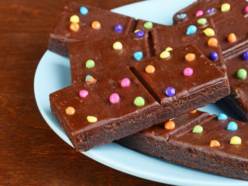 Cosmic Brownies Recipe, chewy and moist fudge brownies with chocoalte ganache frosting and rainbow chip sprinkles