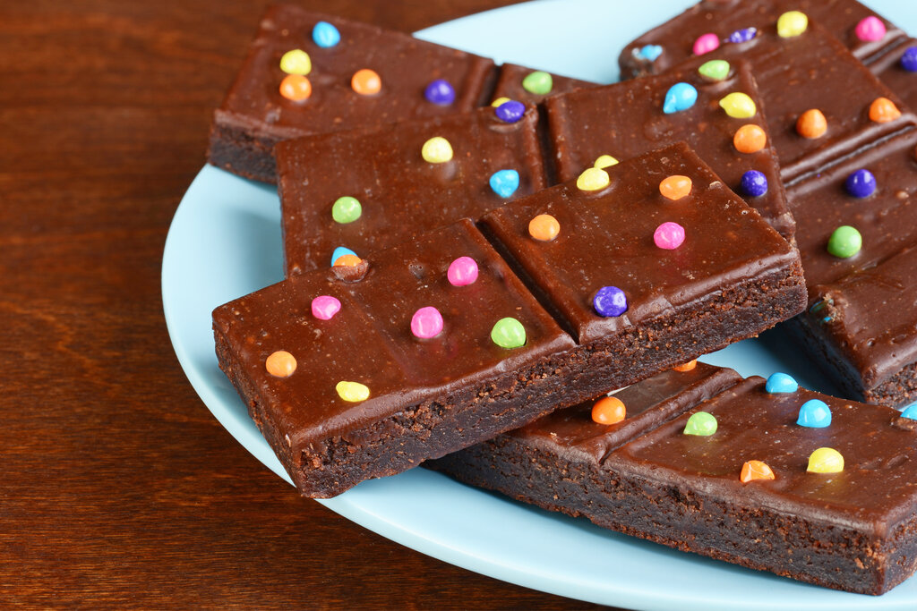 Cosmic Brownies Recipe, chewy and moist fudge brownies with chocoalte ganache frosting and rainbow chip sprinkles