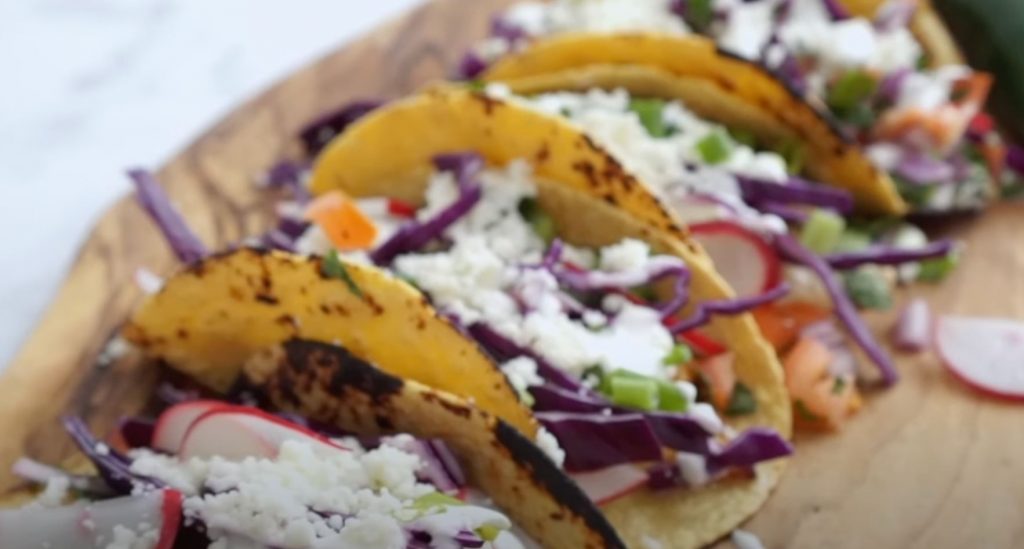 Fish Tacos with Creamy Lime Guacamole and Cabbage Slaw Recipe
