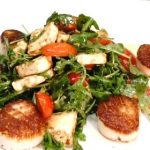 grilled scallops over mixed-green and herb salad recipe