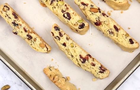 Baking Up Batches of Pistachio Biscotti Dipped in White Chocolate