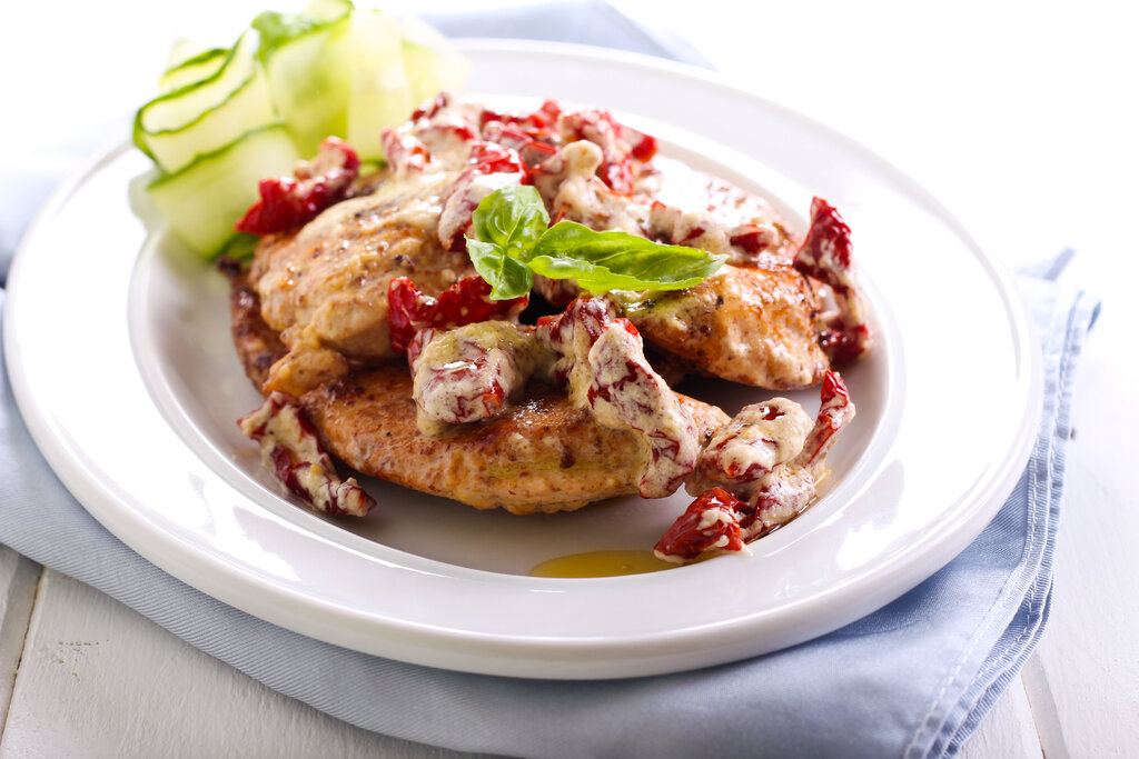 Chicken Bryan Recipe (Carrabba's Copycat), homemade grilled chicken drenched in lemon butter sauce with goat cheese and sun dried tomatoes