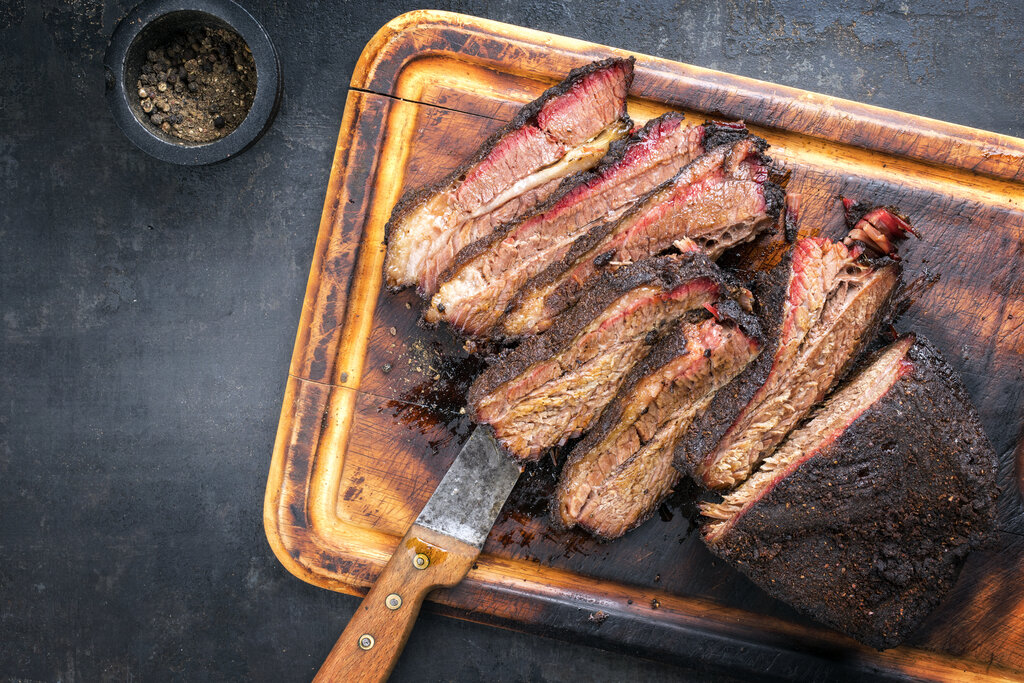 Cooking steak shop in a smoker